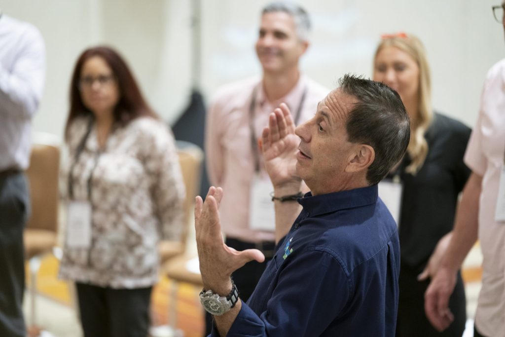 Joe Hammer leading a corporate sales persuasion training session